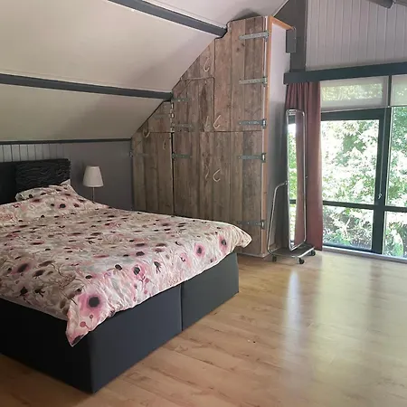 Nyaraló Heerlijk-huisje Zandschel